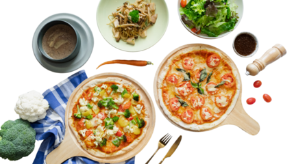 An overhead shot showcasing various delicious food items, including two pizzas with different toppings, a green salad, pasta, a bowl of sauce, and other ingredients