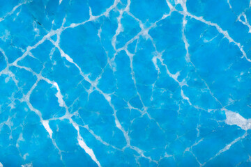 Blue marble texture. Surface natural blue marble with white color veins, background, close-up, high resolution.