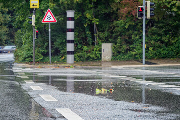 speed cam red light camera at pedestrian crossing with round blitzer camera