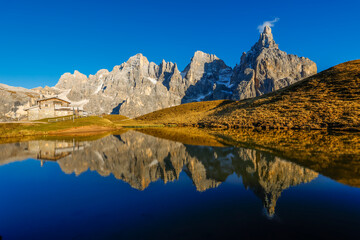 Late autumn scenic landscape of Baita Segantini in Trentino Alto Adige, Pale di San Martino, Italy,...
