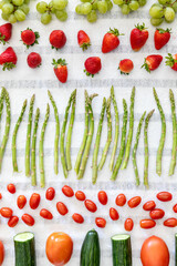Freshly washed produce drying on a towel, to prepare for storage.