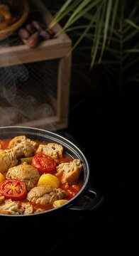 Hearty Bahraini Margoog Bil Dajaj in Black Pot &ndash; Hand-Torn Bread in Chicken & Vegetable Stew, Chicken Coop Fragment & Date Palm Backdrop | Warm Home Food Photography