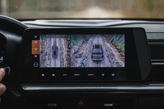 vehicle display overview, dual camera view with telemetry, muddy trail view with vehicle monitoring