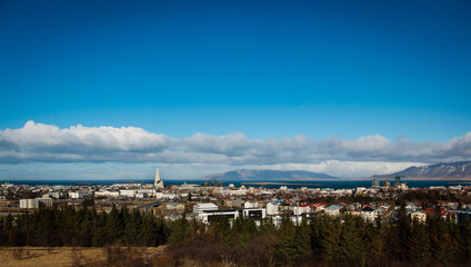 Reykjavik, Iceland, panoramic city view with Hallgrimskirkja and ocean in background