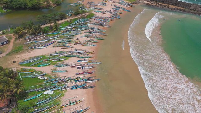 Aerial View of Traditional Outrigger Fishing Boats in a Tropical Bay