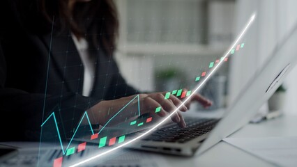A business professional analyzes stock market trends using a laptop in a modern office. The image symbolizes financial growth and investment strategy. Copula