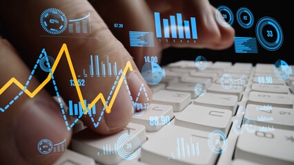 A close-up view of hands typing on a keyboard with overlaid data visualizations including charts and graphs, representing business growth and digital marketing insights. Xenic