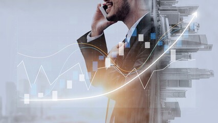 A businessman engaged in a phone conversation stands against a dynamic financial chart overlay, symbolizing growth and success in the urban landscape. Copula