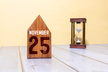 Wooden Calendar Showing the Date of November 25th.