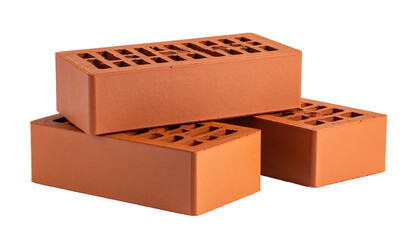 Three stacked red clay bricks on black background, illuminated and showing aeration holes throughout the structures