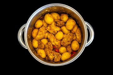 Traditional Brazilian dish of rice, chicken, and pequi (Brazilian caryocar), known as Goiana chicken stew.