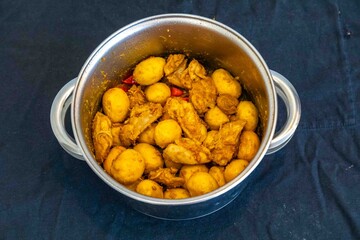 Traditional Brazilian dish of rice, chicken, and pequi (Brazilian caryocar), known as Goiana chicken stew.