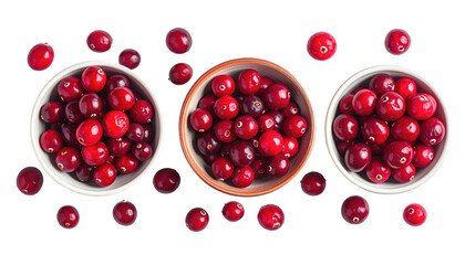 Three bowls filled with shiny, red cranberries scattered on a dark background, creating a vibrant and appetizing display