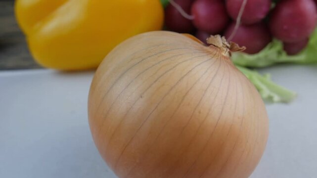 fresh onions on a wooden background