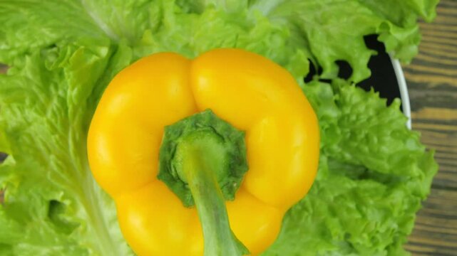 lettuce and sweet bell pepper on a rotating backgr