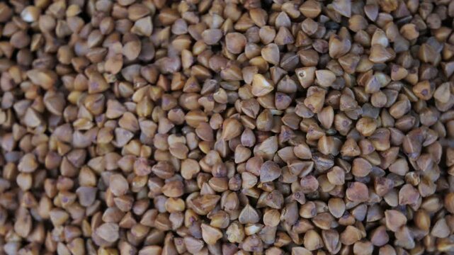 buckwheat groats on a rotating background