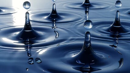 Close-up of water droplets creating ripples on a serene blue surface - Powered by Adobe