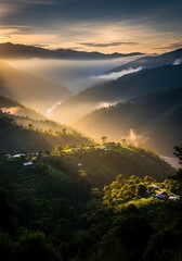 Sunlit Valleys - A Serene Landscape of Hills and Mist.