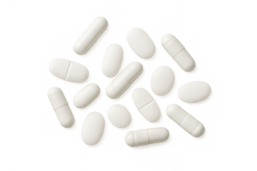 White medical pills and capsules falling, representing health, pharmacy, treatment, and medication, on transparent background