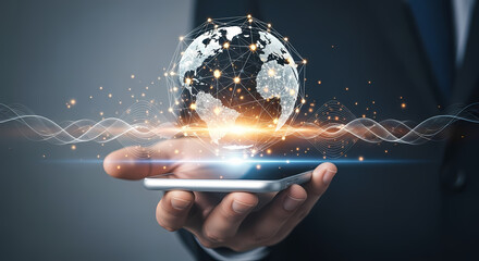 A person's hand holds a smartphone displaying a digital globe with connections, symbolizing global communication and technology innovation.