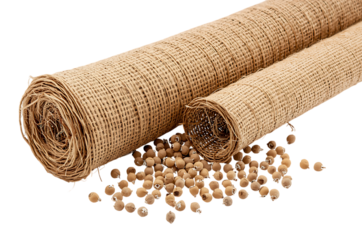 Rolled burlap fabric and scattered seeds against a dark background