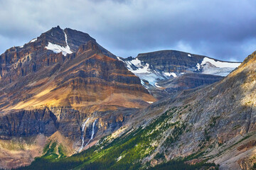 Rocky Mountain Peaks Glacier Waterfall and Forest in Canadian Wilderness