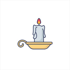 Burning candle sits in golden candlestick on white surface, casting soft light and creating a warm, peaceful ambiance.