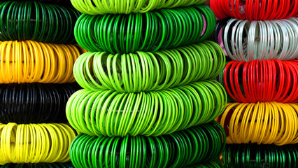 Colorful bangles stacked in a beauty shop