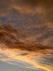 Golden Sunset Sky with Dramatic Clouds over the Horizon. Sydney, NSW, Australia.