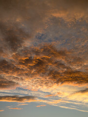 Golden Sunset Sky with Dramatic Clouds over the Horizon. Sydney, NSW, Australia.
