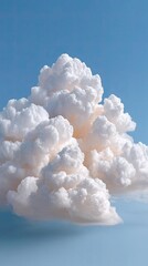 Dramatic Towering White Cumulus Clouds Against a Clear Blue Sky with Soft Sunlight Illuminating the Edges