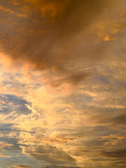 Golden Sunset Sky with Dramatic Clouds over the Horizon. Sydney, NSW, Australia.