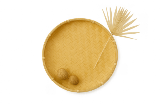 Woven bamboo tray with dried palm leaf and natural decor