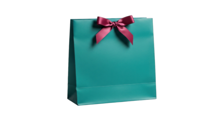 Elegant teal gift bag with a beautiful red bow for presents.
