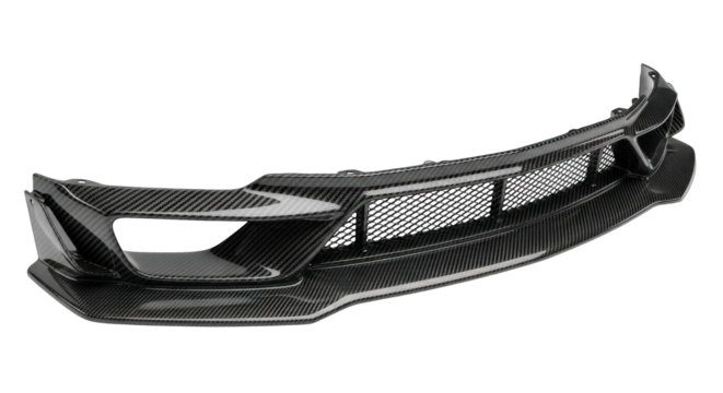 Sleek carbon fiber front bumper spoiler for a sports car isolated on white.