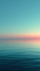 Obraz premium Tranquil Ocean Surface Under Soft Pastel Sunset Sky Reflection