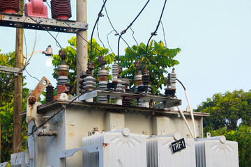 An electricity transformer in the countryside of Bangladesh. Selective focus