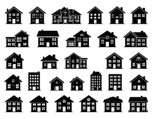 A collection of diverse black silhouette house icons against a white backdrop