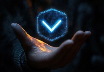 Close-up of a hand holding a glowing blue holographic checkmark symbol in a dark environment, emitting light and futuristic energy