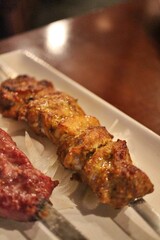 Afghan cuisine: mutton kabob and murgh (Afghan chicken)