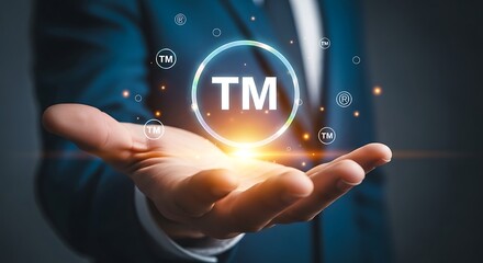 The Concept of Trademark A Business Professional's Approach Showing the "TM" Symbol on Hand in a Digital Environment