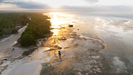 Walakiri's Beauty at Low Tide: A Stunning Panorama of Sand and Sunset