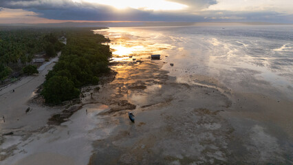 Walakiri's Beauty at Low Tide: A Stunning Panorama of Sand and Sunset