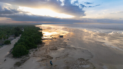 Walakiri's Beauty at Low Tide: A Stunning Panorama of Sand and Sunset