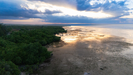 Walakiri's Beauty at Low Tide: A Stunning Panorama of Sand and Sunset