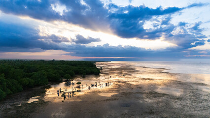 Walakiri's Beauty at Low Tide: A Stunning Panorama of Sand and Sunset