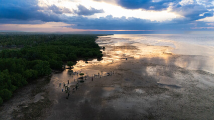 Walakiri's Beauty at Low Tide: A Stunning Panorama of Sand and Sunset
