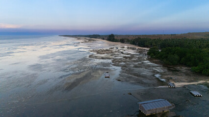 Walakiri's Beauty at Low Tide: A Stunning Panorama of Sand and Sunset