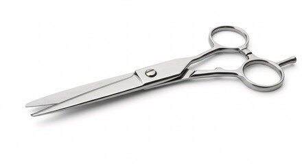 Professional chrome hairdressing scissors with a finger rest isolated on a clean white background for a hair salon or barber shop concept