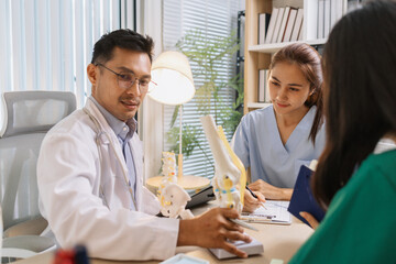 Medical professionals collaborating during a meeting to discuss patient care plans and treatment strategies. Doctors and nurses share expertise and analyze clinical data for better healthcare outcomes